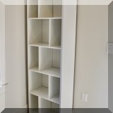 F22. White bookcase. 76”h x 24”w x 13”d 